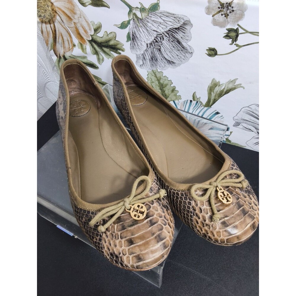 Tory Burch Chic brown snakeskin flats with iconic gold logo.